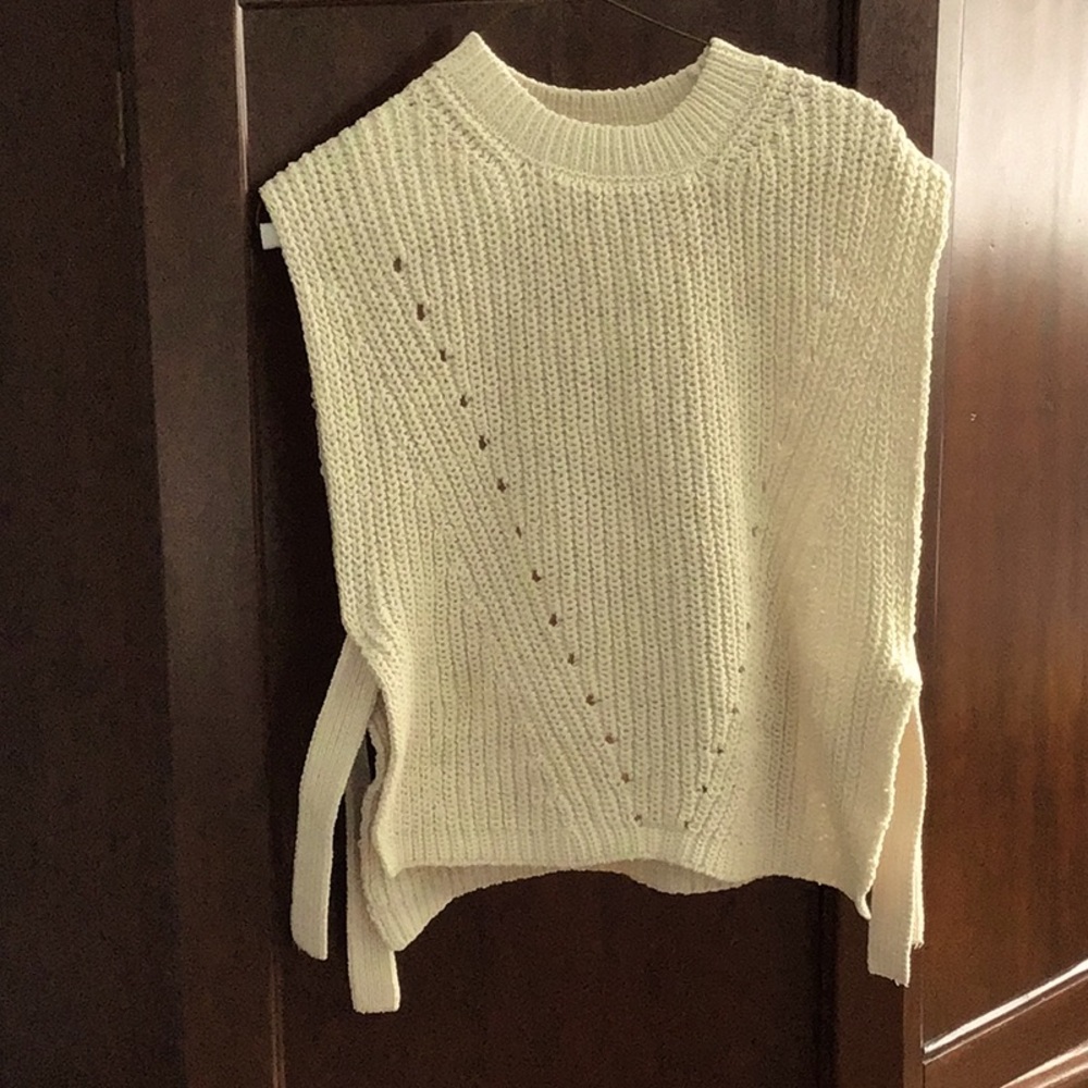 Cream open sided knitted vest for girls in excellent condition.